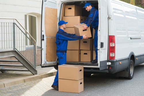 Moving van and boxes prepared for a home move in Fortis Green