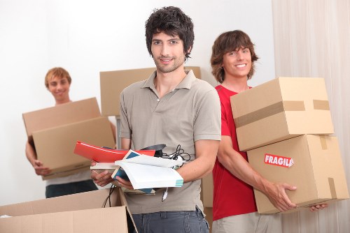 Packed boxes and household items prepared for transport by removals van