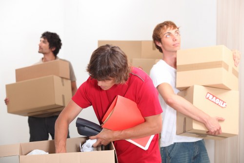 Furniture and boxed belongings being loaded for a North London home removal