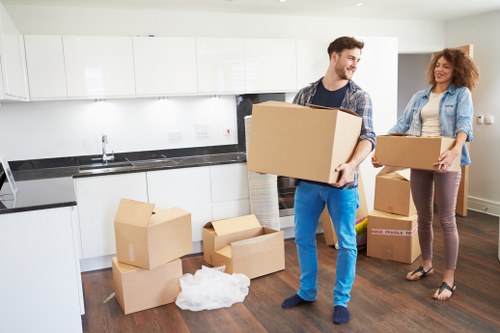 Packed boxes and labelled items ready for a business relocation in Fortis Green