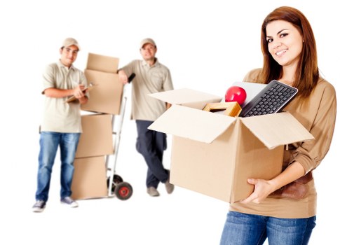 Packed household boxes and furniture ready for house removals in Fortis Green