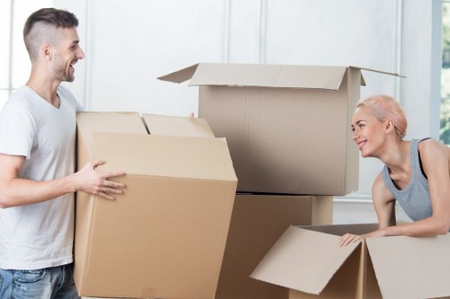 Furniture and boxed items being handled during a Fortis Green move