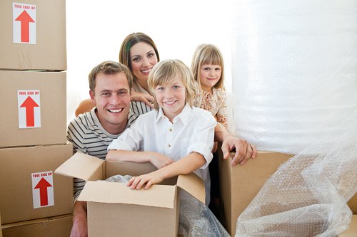 Packed boxes and furniture ready for a local removal service
