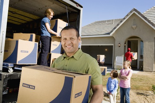 Loading furniture into a truck for a local move